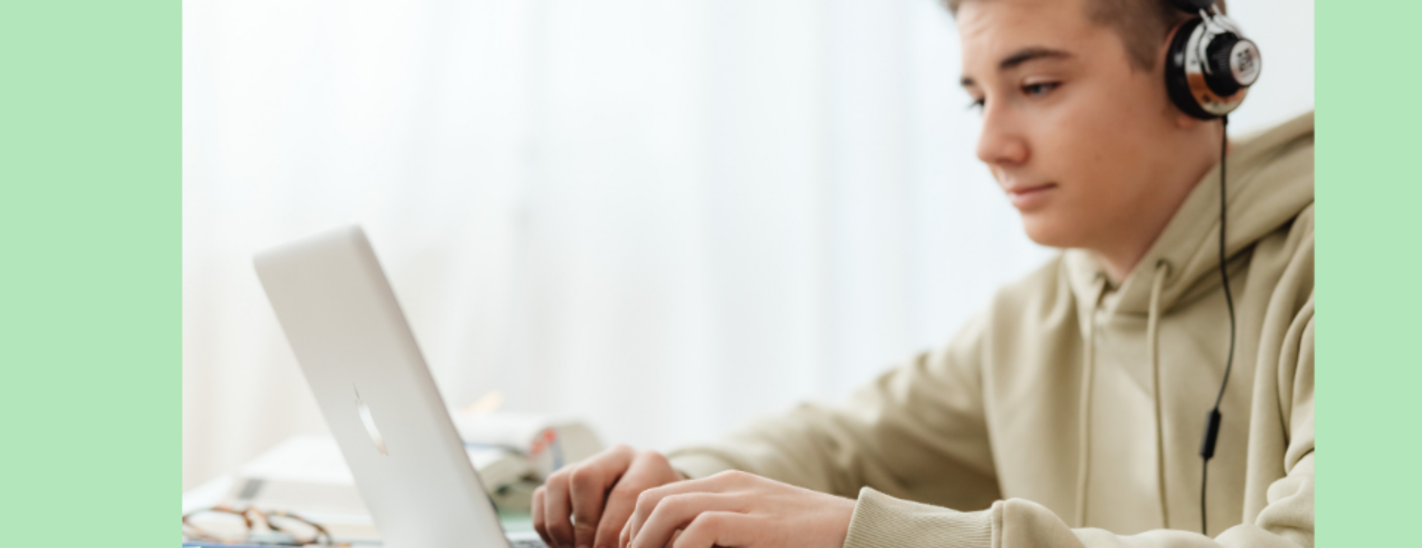 Young-person-using-a-laptop-during-an online-wellbeing-CBT-and-mindfulness-programme