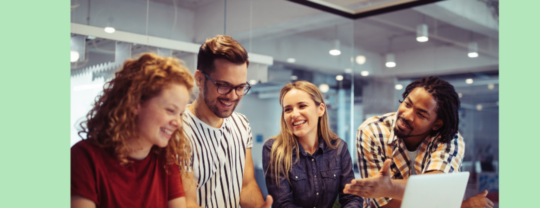 Four-colleagues-taking-part-in-workplace-mental-health-training-session-in-an-office-setting