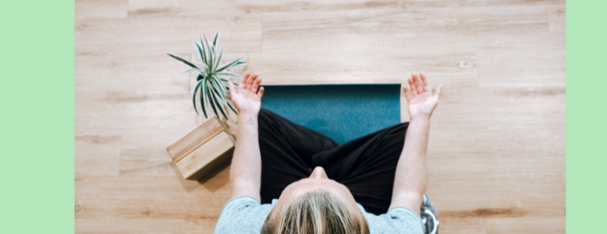 a-woman-sitting-on-the-floor-cross-legged-engaging-in-mindfulness